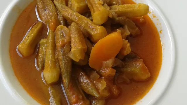 A dish of okra cooked in tomato stew