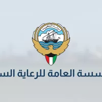 شعار دولة الكويت واسم المؤسسة العامة للرعاية السكنية على خلفية مموهة