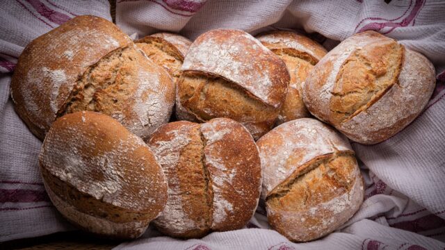 Round sourdough loaves on cloth