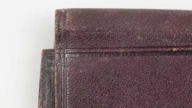 A closed leather wallet