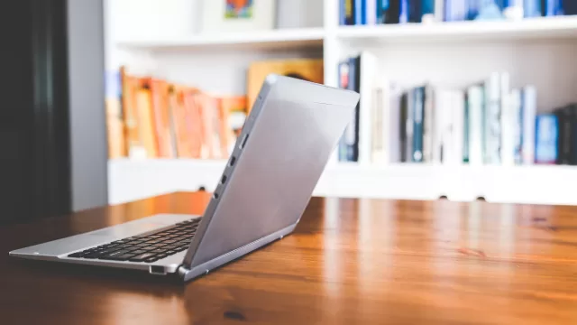 Laptop on a wooden desk